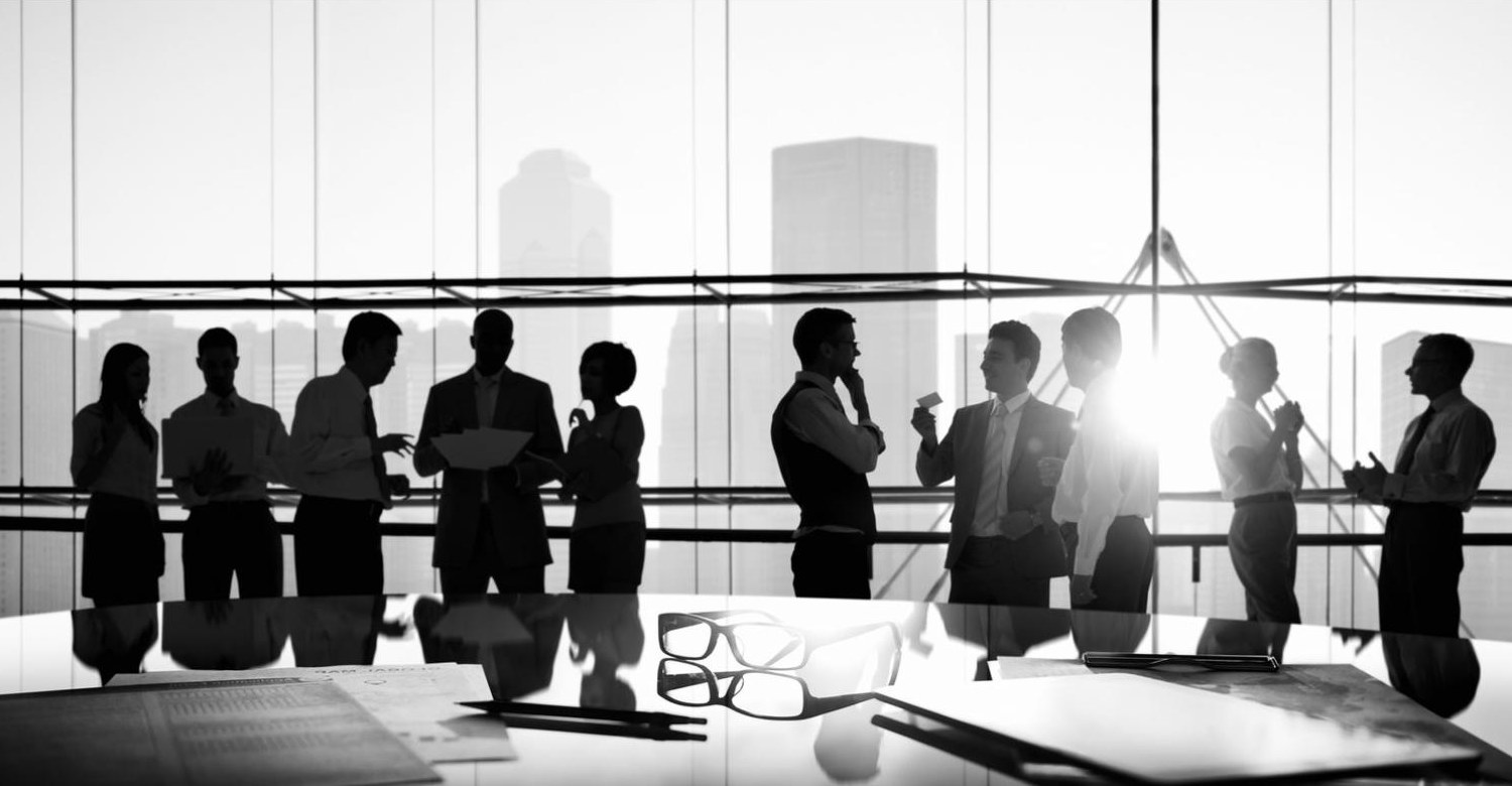 Business team meeting at sunrise